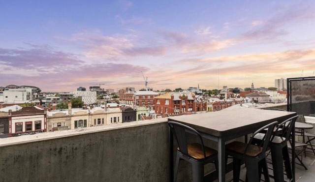 Sunrise rooftop views above eclectic Fitzroy
