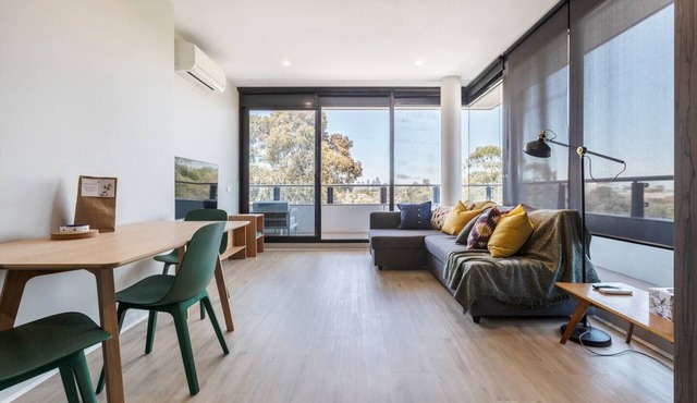 Terra Cotta Brunswick Retreat with Breezy Balcony