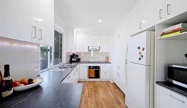 This two-bedroom cottage in Bargara is perfect for your summer coastal escape! in Bargara