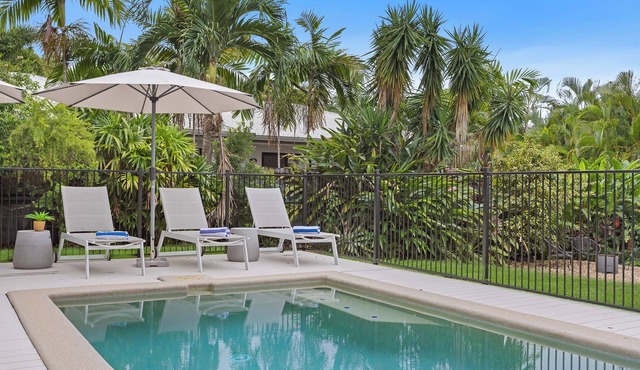 Tropical Palm Cove Home w/Heated Pool & Pet-Friendly