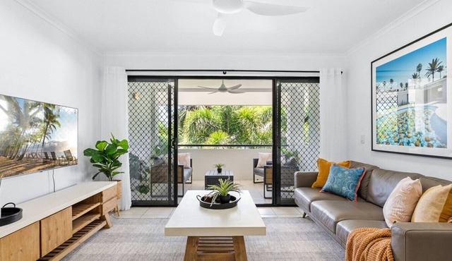 Tropical Top-Floor Retreat with Pool Access