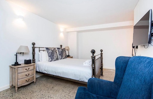 Restful Room in the City with Rooftop Terrace