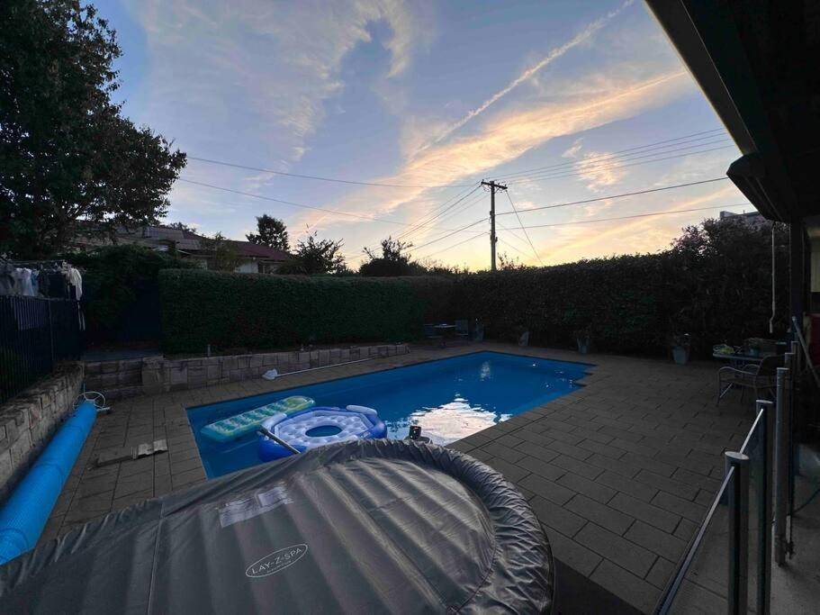 Hughes House | Resort style home pool spa sauna