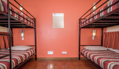 Bed in 8-Bed Female Dormitory with Shared Bathroom