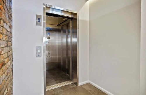 Hobart Central Business District Apartment | Vintage Suite at Saddlers Embrace a Cafe Lifestyle