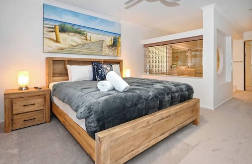 Pelican Waters Apartment | Take time to look through the stunning photos of this unique waterfront home.
