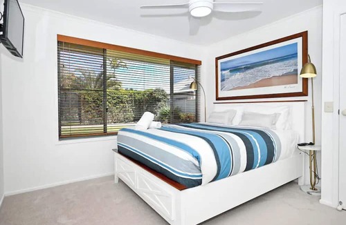 Pelican Waters Apartment | Take time to look through the stunning photos of this unique waterfront home.