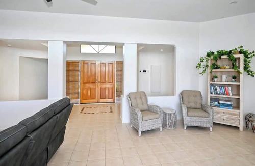 Pelican Waters Apartment | Take time to look through the stunning photos of this unique waterfront home.