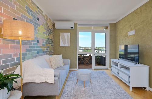 Fremantle Apartment | Wake up to panoramic Fremantle views from this bright, centrally located apartment. Just a short walk to Cappuccino Strip, Fishing Boat Harbour, Bathers Beach and the Rottnest Ferry. Enjoy a private balcony, free secure parking, fast WiFi, fu