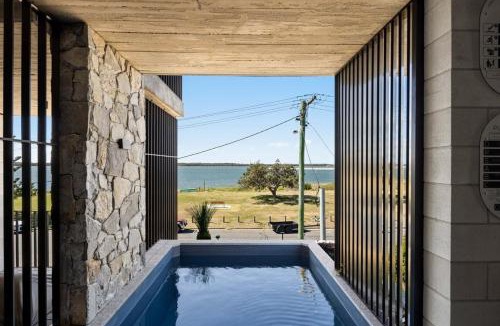 Runaway Bay House | Stone & Tide by Aryve