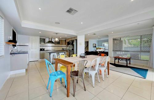 Banksia Beach House | Spacious Family & Pet-friendly Home on the Canal