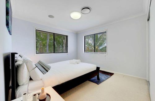 Banksia Beach House | Spacious Family & Pet-friendly Home on the Canal