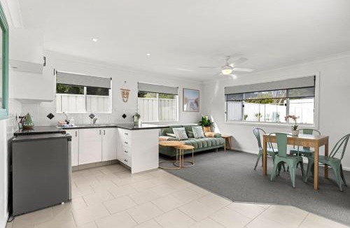 Callala Bay House | Samphire House - Fireplace with Heated Swimming Pool