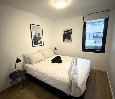 Brunswick East Apartment | Stylish Condo Apartment with Stunning Rooftop Views & Pool, Gym and Hot Tubs by Peppy Beach Retreats
